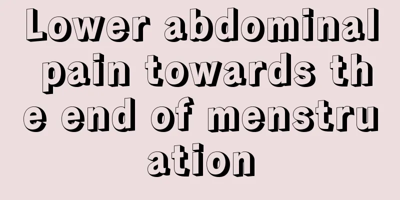 Lower abdominal pain towards the end of menstruation