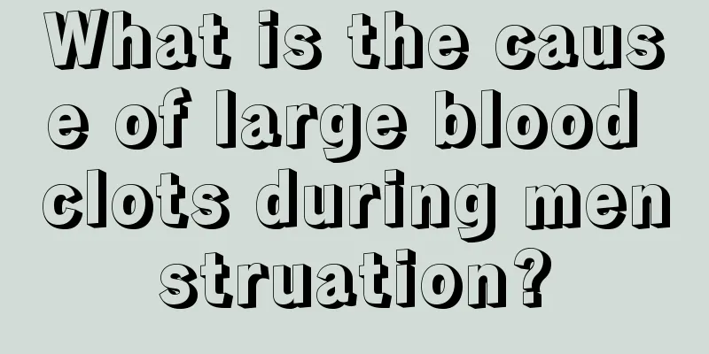 What is the cause of large blood clots during menstruation?