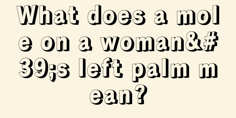 What does a mole on a woman's left palm mean?