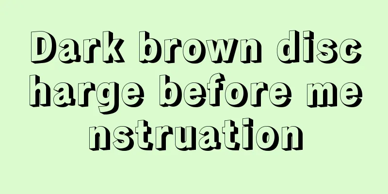 Dark brown discharge before menstruation