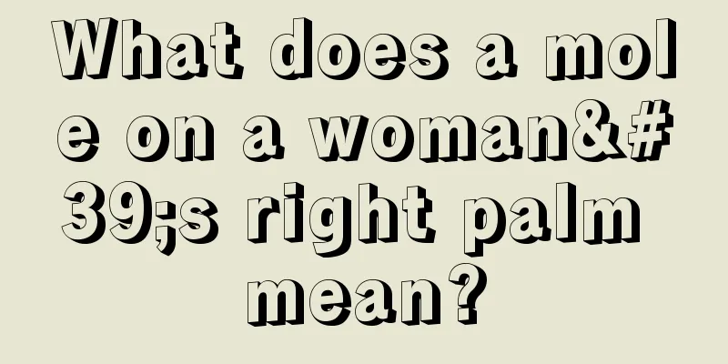 What does a mole on a woman's right palm mean?