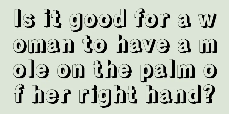 Is it good for a woman to have a mole on the palm of her right hand?
