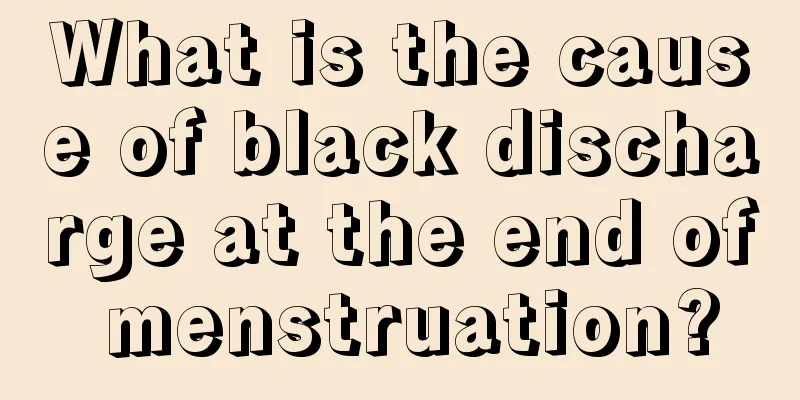 What is the cause of black discharge at the end of menstruation?