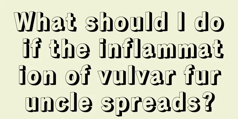 What should I do if the inflammation of vulvar furuncle spreads?