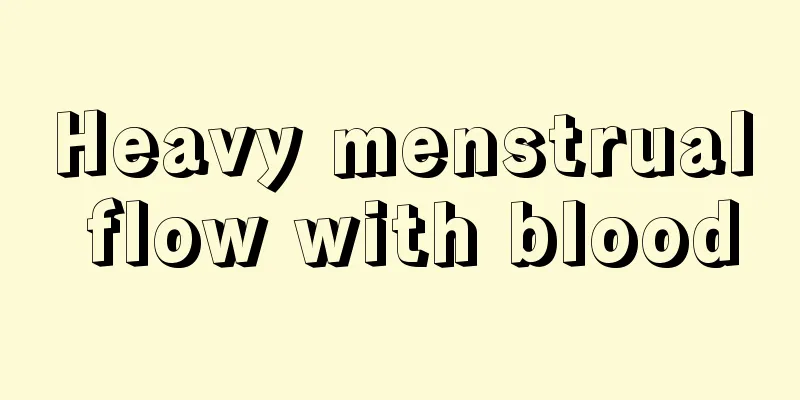 Heavy menstrual flow with blood