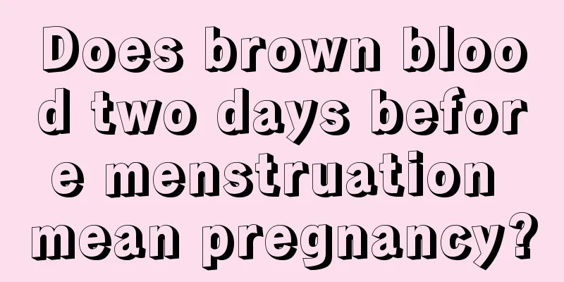 Does brown blood two days before menstruation mean pregnancy?