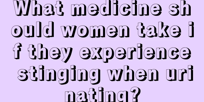 What medicine should women take if they experience stinging when urinating?