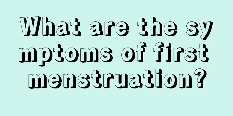 What are the symptoms of first menstruation?