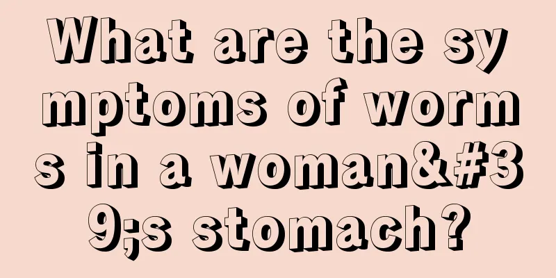 What are the symptoms of worms in a woman's stomach?