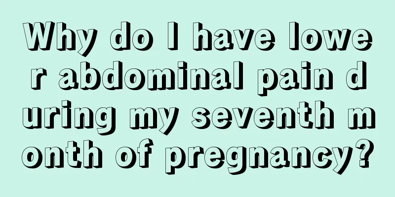 Why do I have lower abdominal pain during my seventh month of pregnancy?