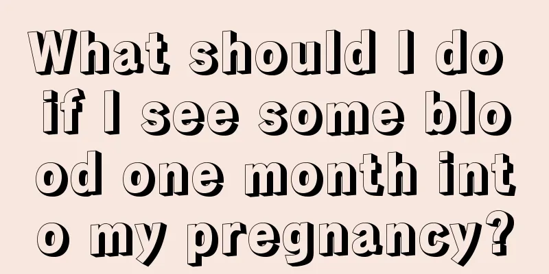 What should I do if I see some blood one month into my pregnancy?