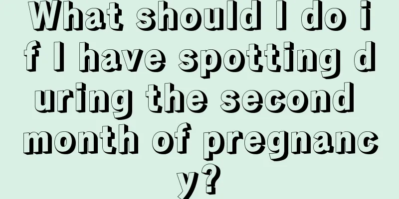 What should I do if I have spotting during the second month of pregnancy?