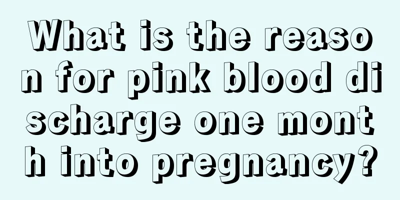 What is the reason for pink blood discharge one month into pregnancy?