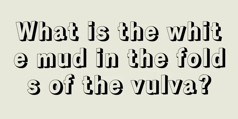 What is the white mud in the folds of the vulva?