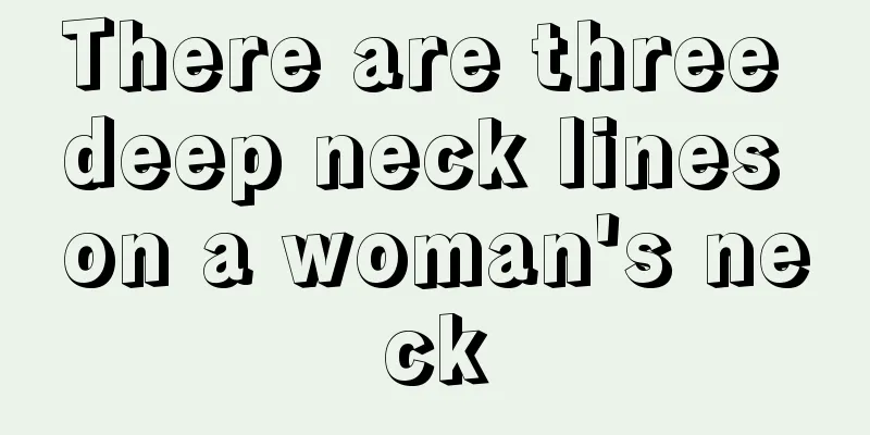 There are three deep neck lines on a woman's neck