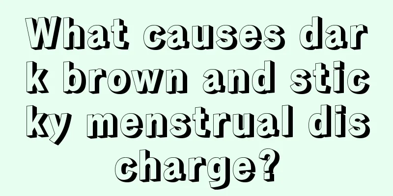 What causes dark brown and sticky menstrual discharge?