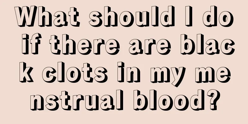 What should I do if there are black clots in my menstrual blood?