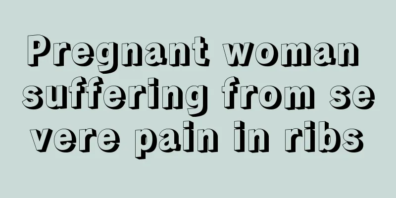 Pregnant woman suffering from severe pain in ribs