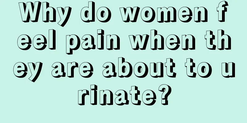 Why do women feel pain when they are about to urinate?