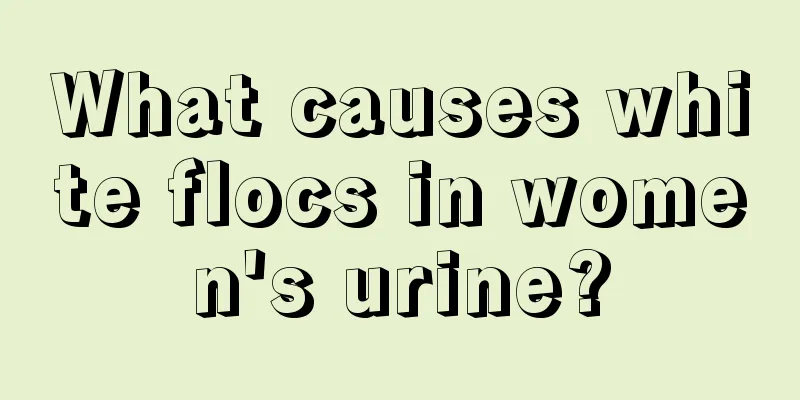 What causes white flocs in women's urine?