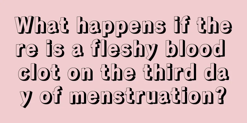 What happens if there is a fleshy blood clot on the third day of menstruation?