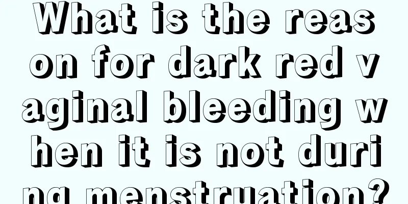 What is the reason for dark red vaginal bleeding when it is not during menstruation?