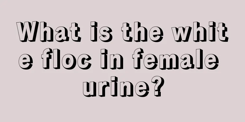 What is the white floc in female urine?