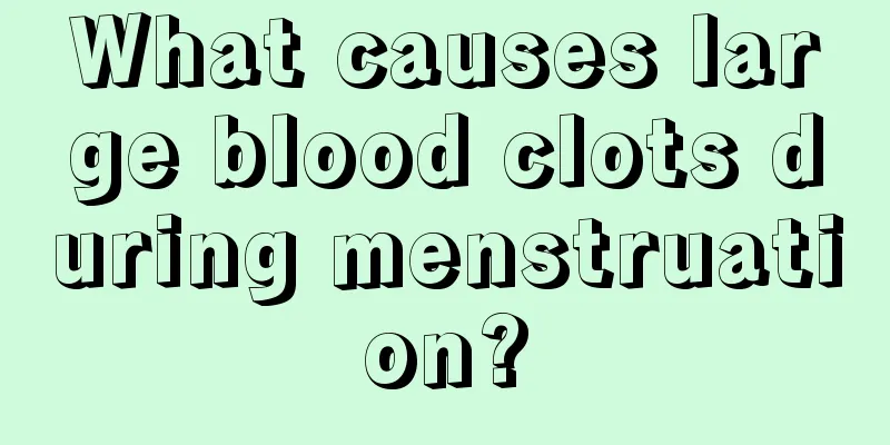 What causes large blood clots during menstruation?