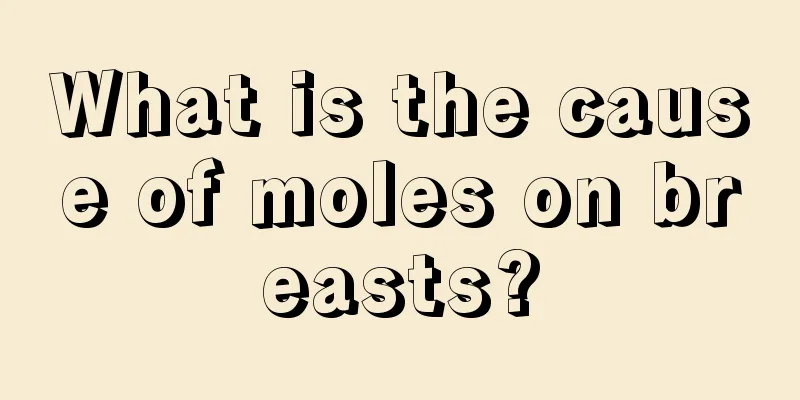 What is the cause of moles on breasts?