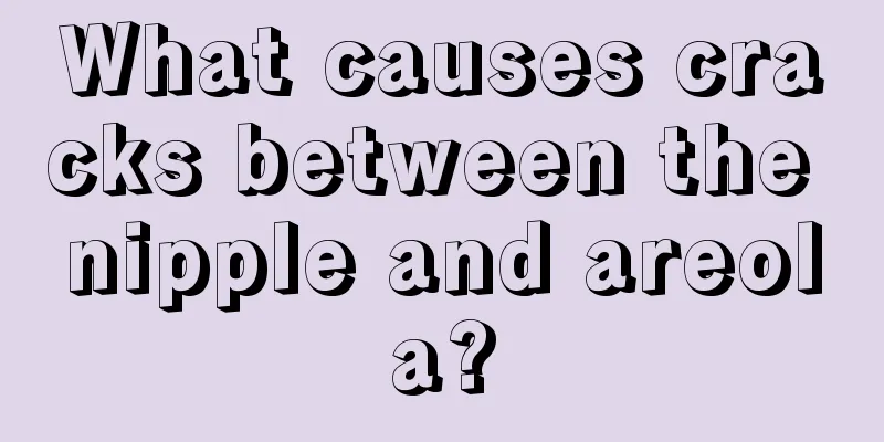 What causes cracks between the nipple and areola?