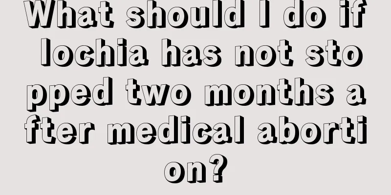 What should I do if lochia has not stopped two months after medical abortion?