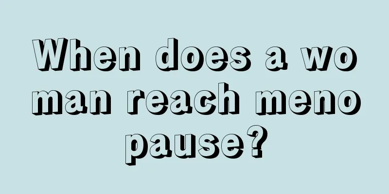 When does a woman reach menopause?