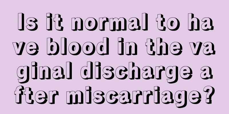 Is it normal to have blood in the vaginal discharge after miscarriage?