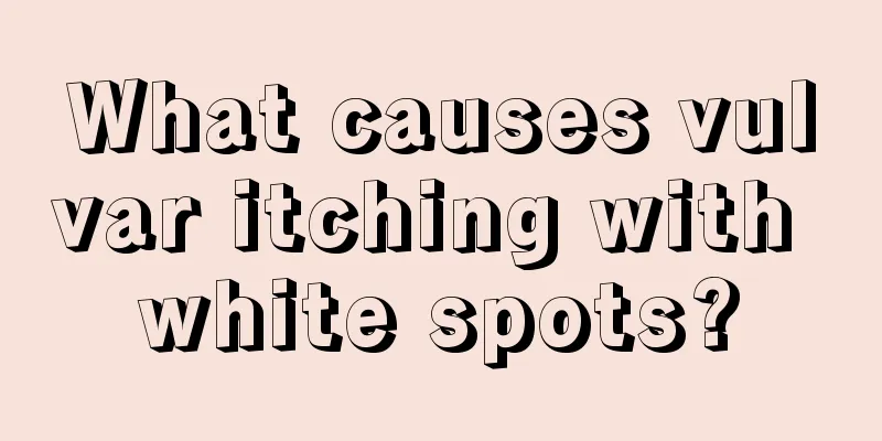 What causes vulvar itching with white spots?