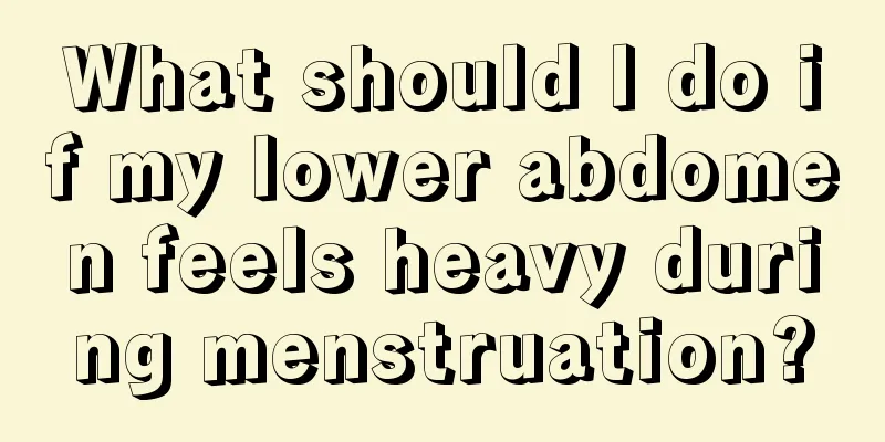 What should I do if my lower abdomen feels heavy during menstruation?