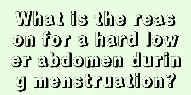 What is the reason for a hard lower abdomen during menstruation?