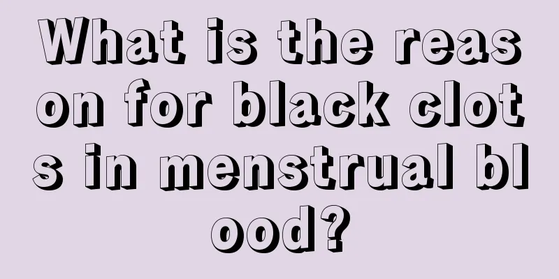 What is the reason for black clots in menstrual blood?