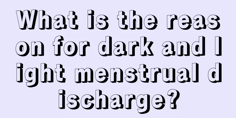 What is the reason for dark and light menstrual discharge?