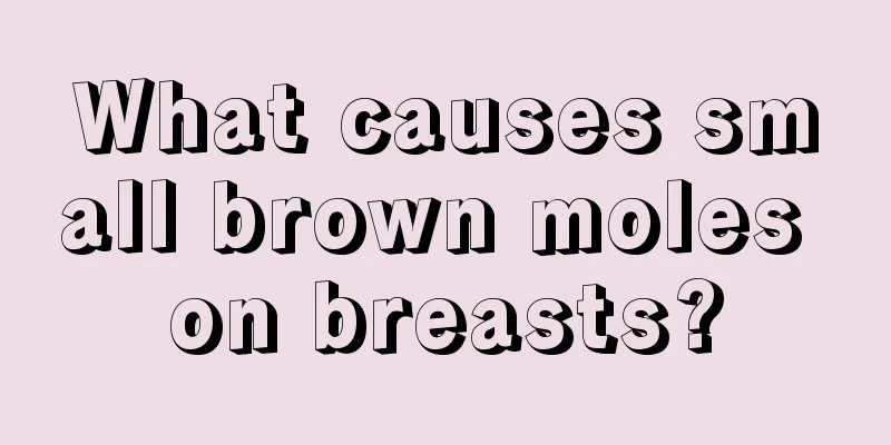 What causes small brown moles on breasts?