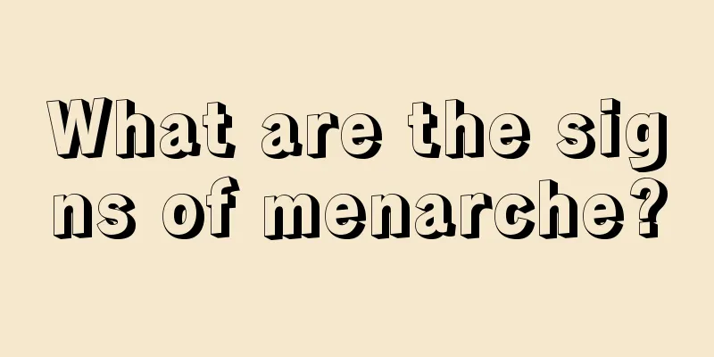 What are the signs of menarche?