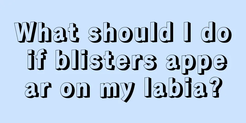 What should I do if blisters appear on my labia?