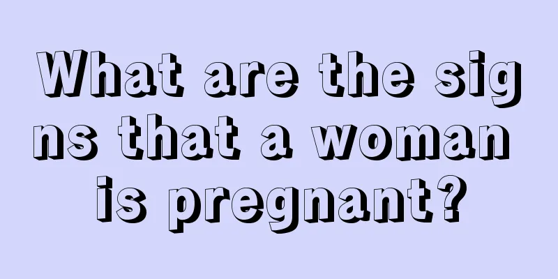 What are the signs that a woman is pregnant?