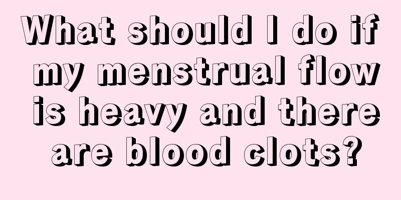 What should I do if my menstrual flow is heavy and there are blood clots?