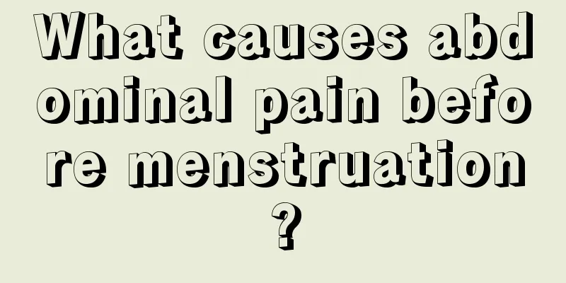 What causes abdominal pain before menstruation?