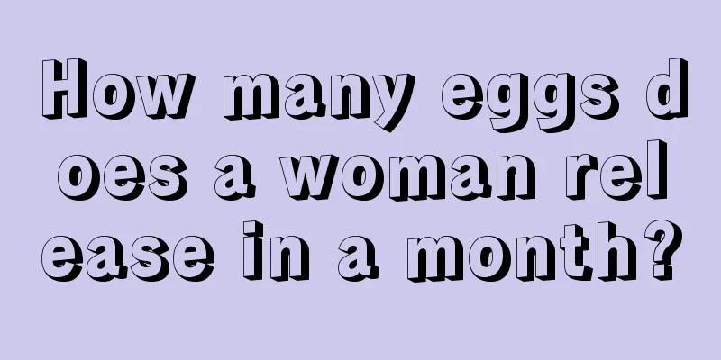 How many eggs does a woman release in a month?