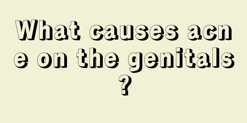 What causes acne on the genitals?