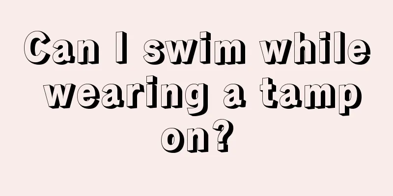 Can I swim while wearing a tampon?