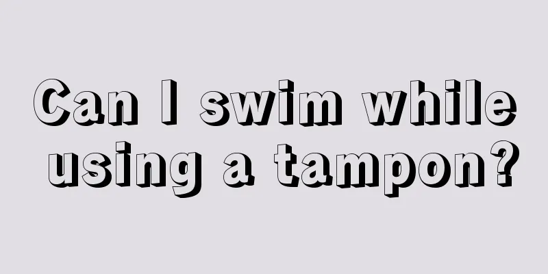 Can I swim while using a tampon?