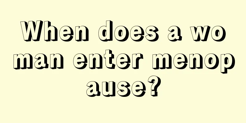 When does a woman enter menopause?