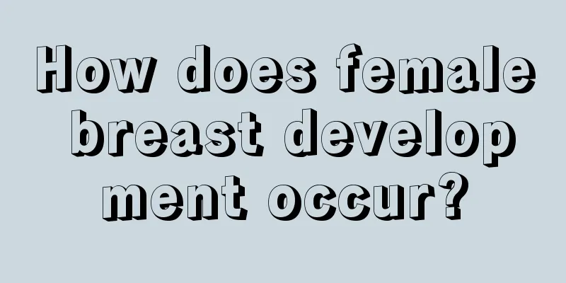 How does female breast development occur?